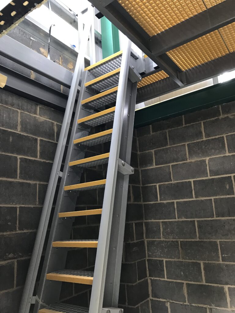 Ships ladder style Access Ladder going up through a GRP floor
