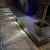 Ancient Wood decking project at night time with lights built in