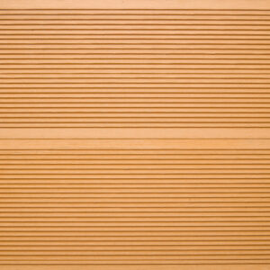 Close up of two WPC solid decking boards in Teak