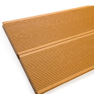 Close up of two WPC solid decking boards in Teak