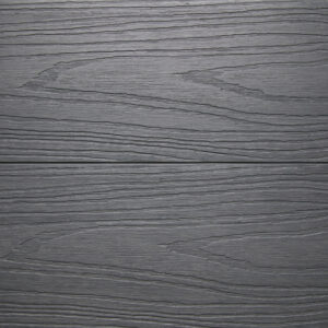 Close up of two WPC woodgrain decking boards in Slate Grey