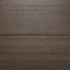 Close up of the back of two WPC Woodgrain Decking boards in Walnut