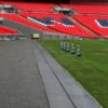 Grey solid top acting as a trench cover on the ground of Wembley Stadium
